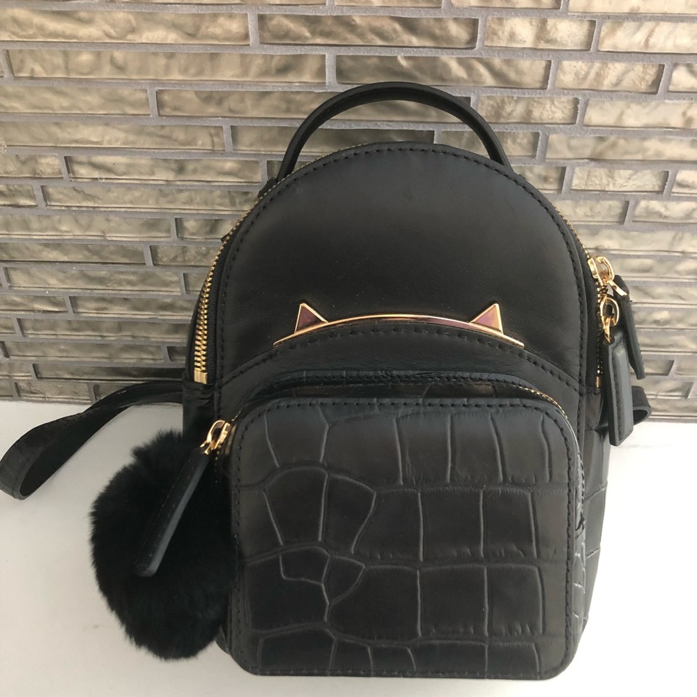 Genuine Leather Mini Backpack with Plush Ball.